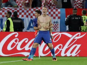 Croatia fight back to beat defending champions Spain and top Group D